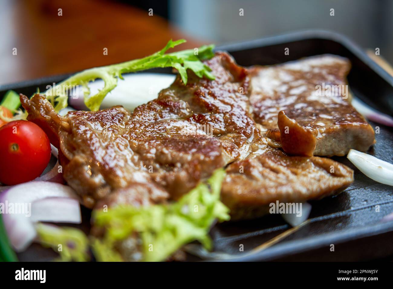 A delicious ribeye steak in a western restaurant Stock Photo Alamy