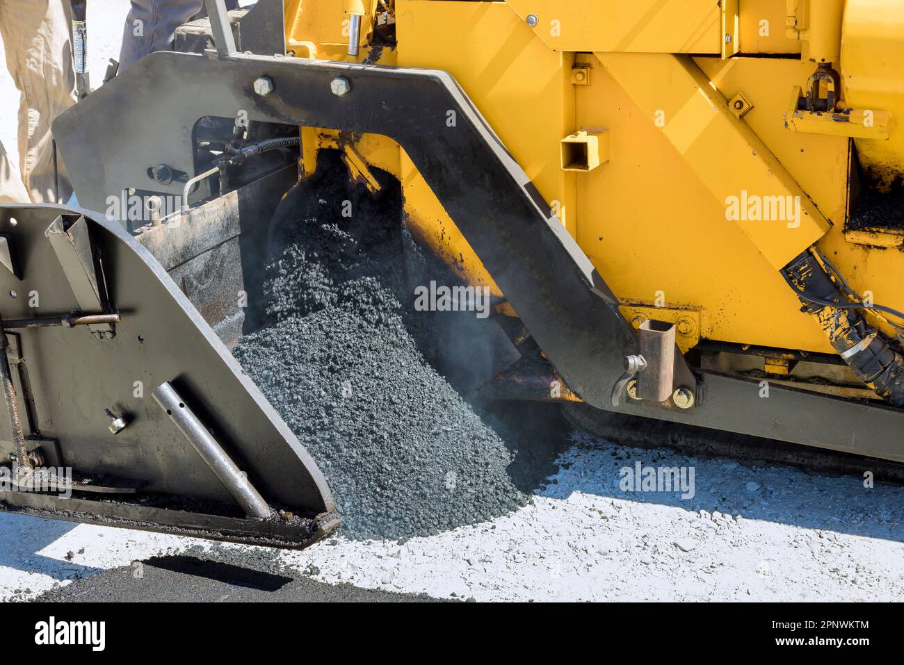 When working on new road, we used an asphalt paver machine steam road