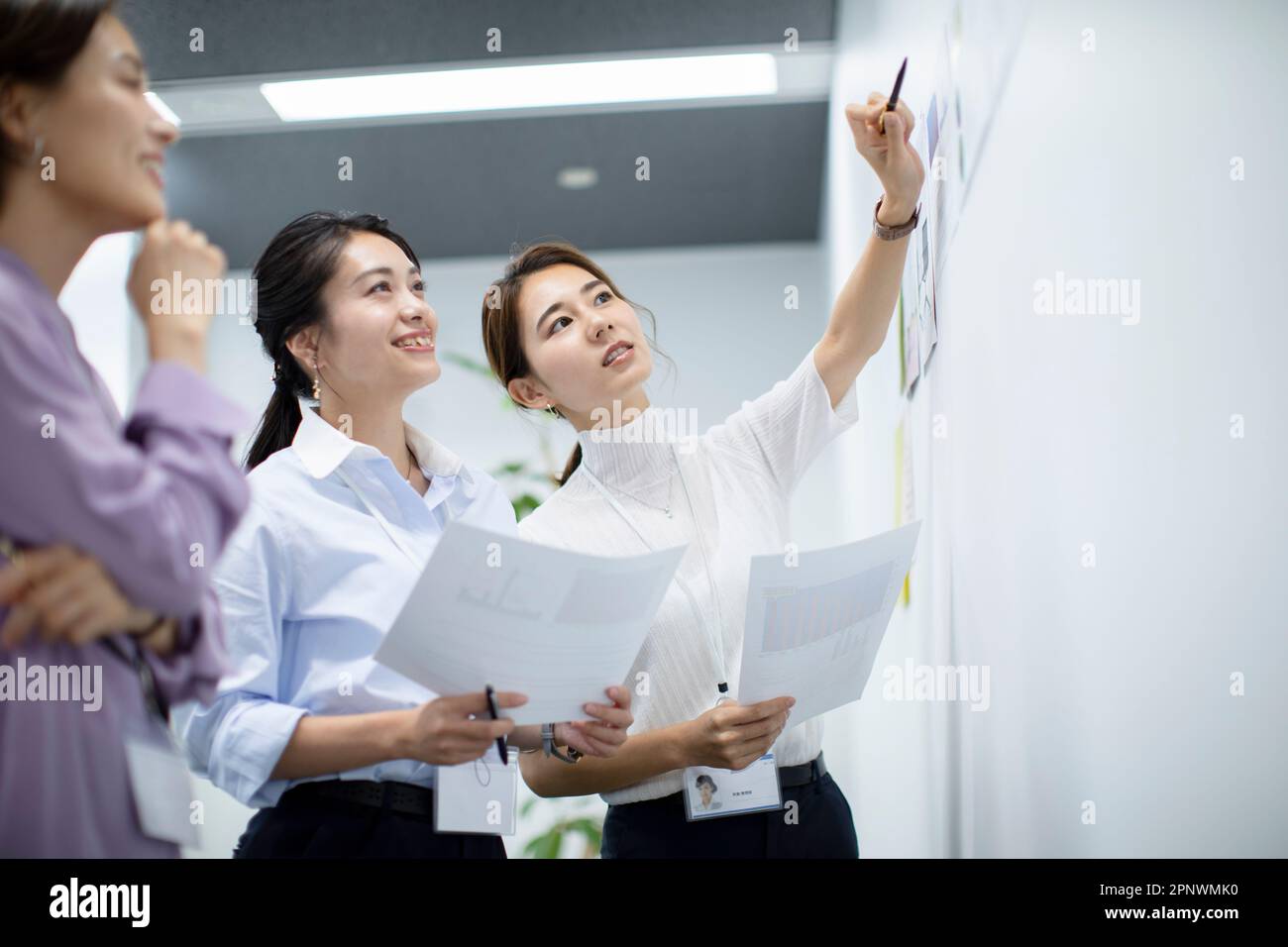 Three businesswomen having a meeting in an office Stock Photo - Alamy