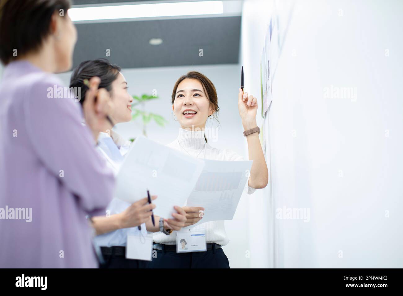 Three businesswomen having a meeting in an office Stock Photo - Alamy