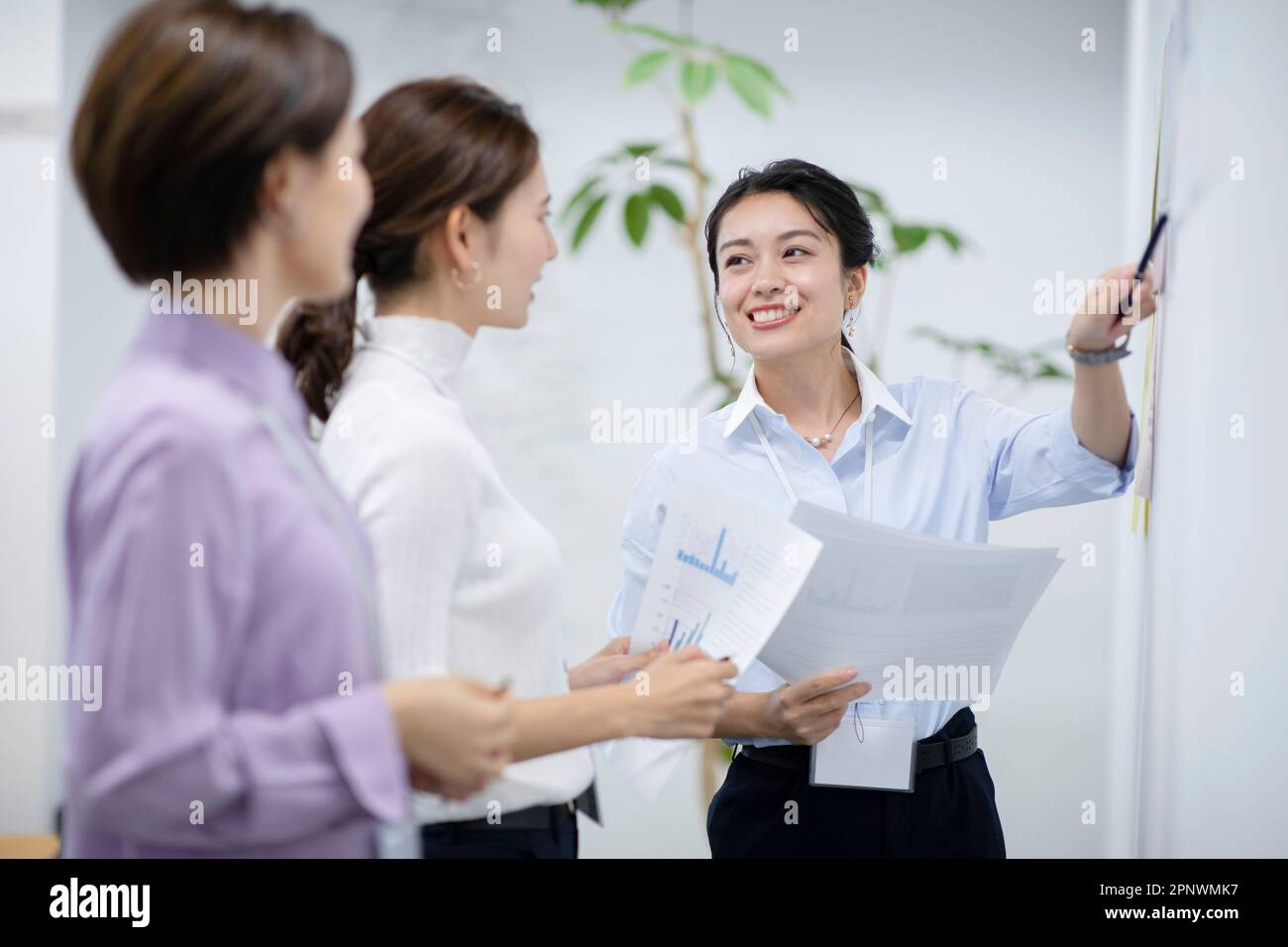 Three businesswomen having a meeting in an office Stock Photo - Alamy