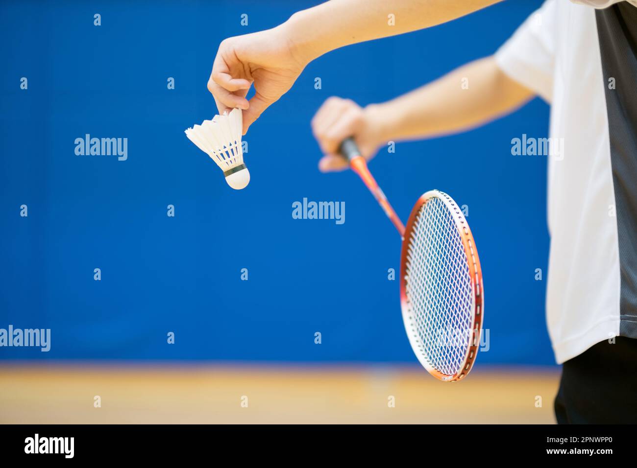 A high school student holding a badminton racket Stock Photo Alamy