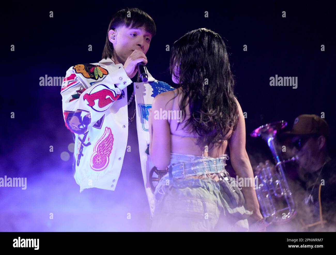 Peso Pluma, left, and Becky G perform at the Latin American Music
