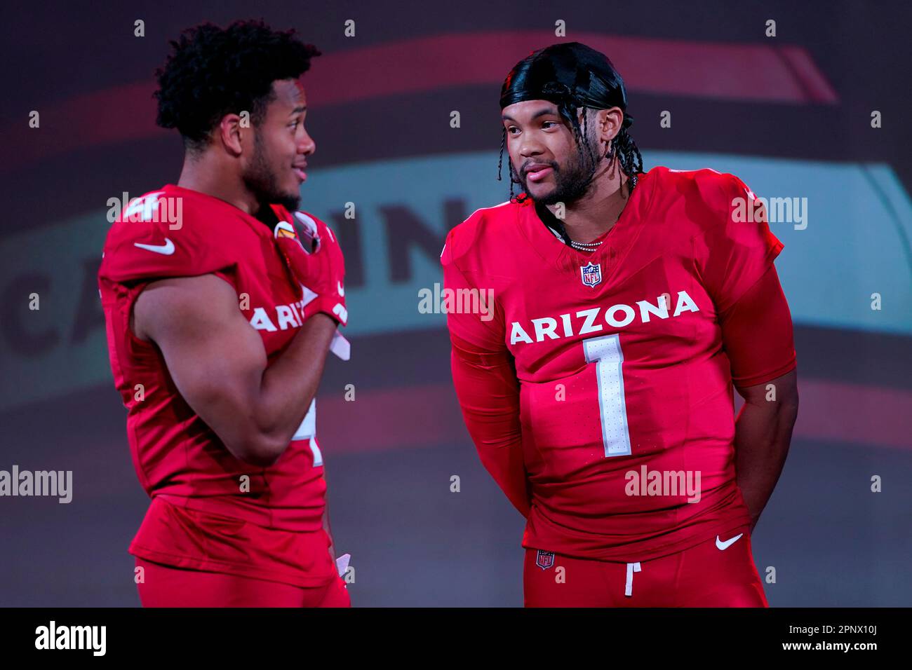 Arizona Cardinals quarterback Kyler Murray (1) and wide receiver Rondale  Moore showcase the NFL football teams' new uniforms for the 2023 season,  Thursday, April 20, 2023, in Phoenix. (AP Photo/Matt York Stock Photo -  Alamy