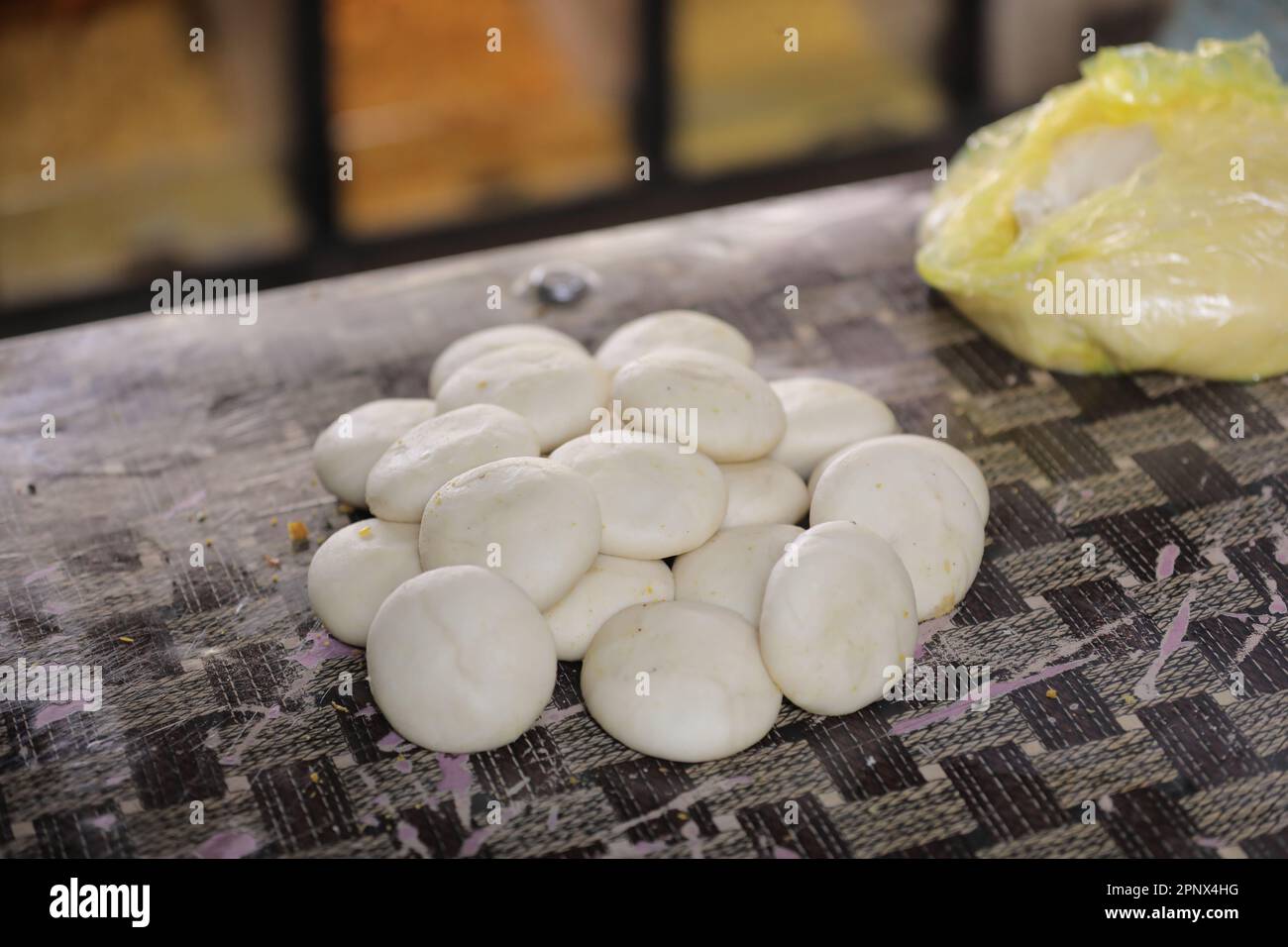 Frying kachori in a Frying Pan at a street food stall , oily food Stock