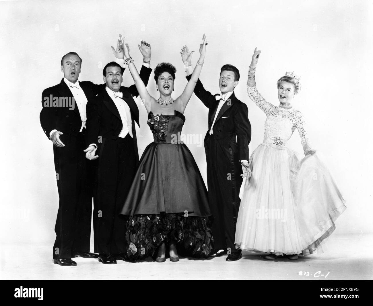 GEORGE SANDERS BILLY DE WOLFE ETHEL MERMAN DONALD O'CONNOR and VERA-ELLEN Publicity Portrait in CALL ME MADM 1953 director WALTER LANG music and lyrics by Irving Berlin stage musical written by Howard Lindsay and Russel Crouse screenplay Arthur Sheekman producer Sol C. Siegel Twentieth Century Fox Stock Photo