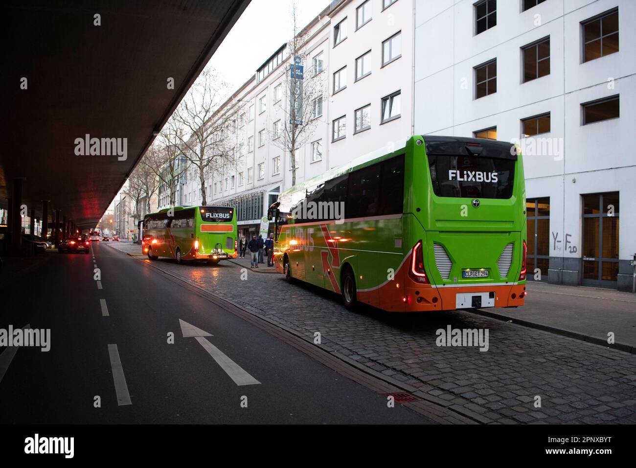 Bremen, Germany. 21st Apr, 2023. Coaches stand at a Flixbus stop. With