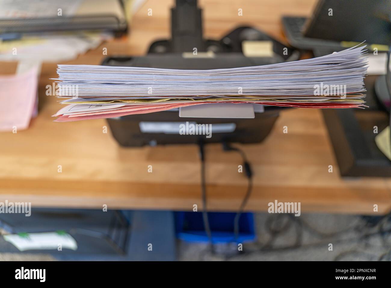 Desktop paper document scanner with stack of documents Stock Photo - Alamy