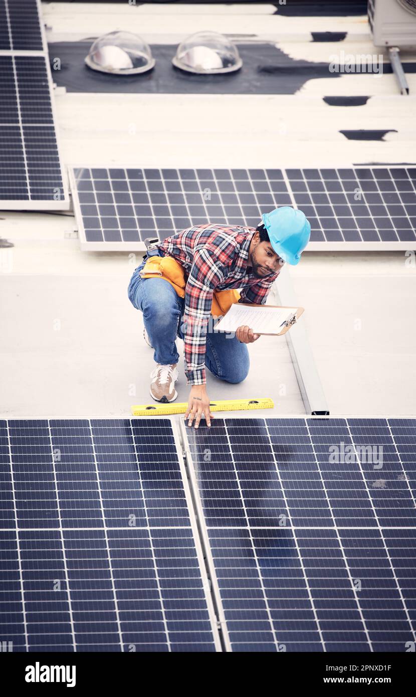 Black man with clipboard, solar panels inspection and renewable energy, sustainable and eco