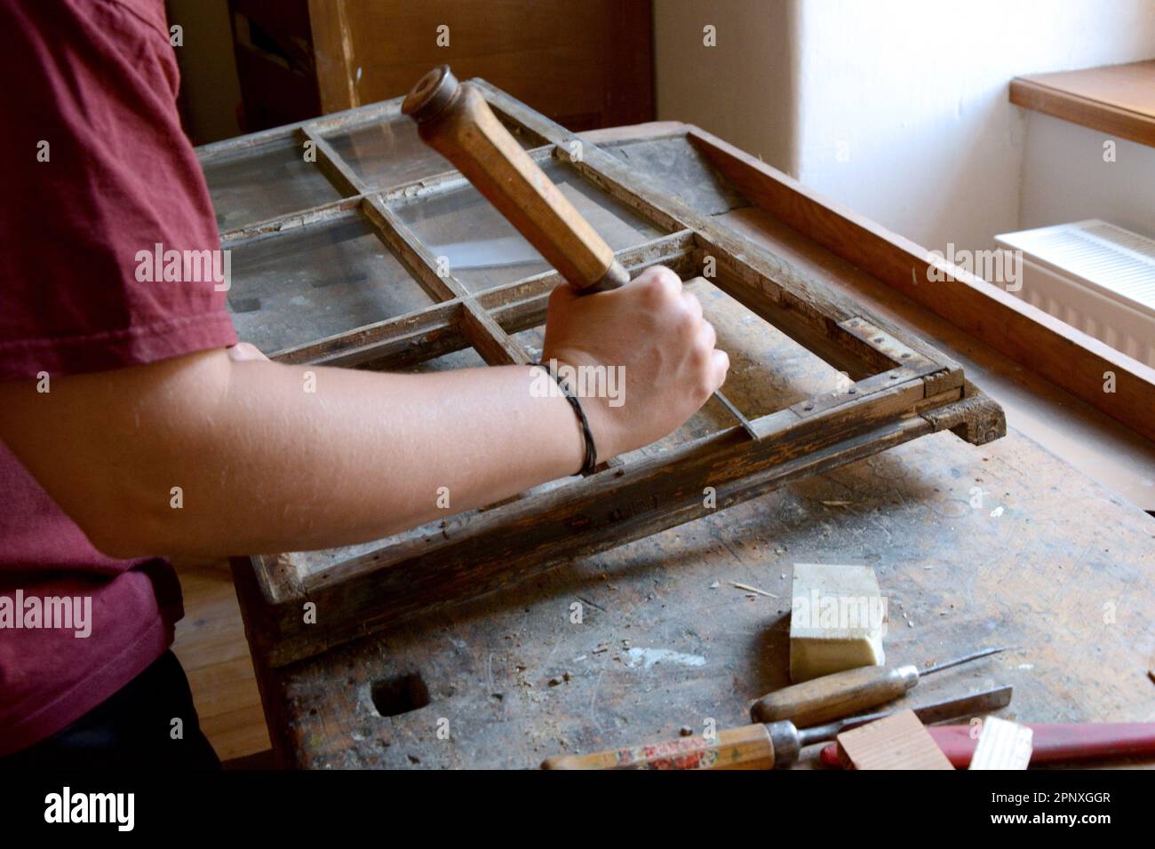 worker fixing old wood window frame Stock Photo Alamy