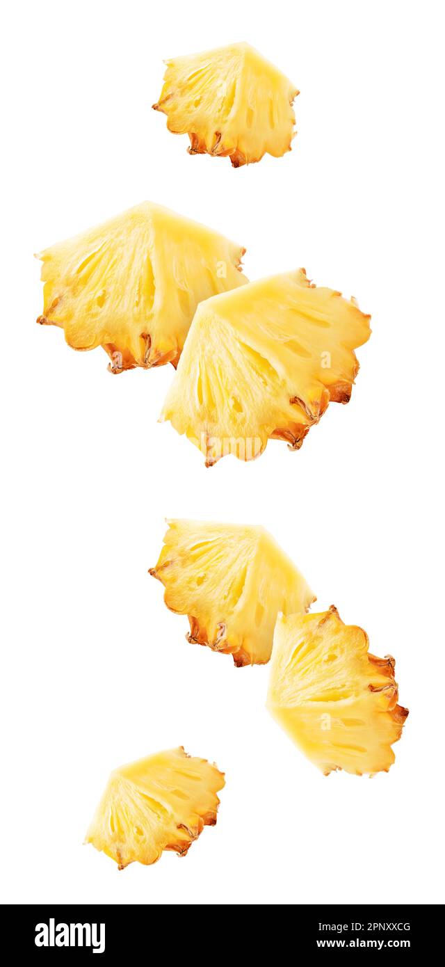 Isolated flying pineapple. Falling sliced ananas fruit isolated on white background with clipping path Stock Photo