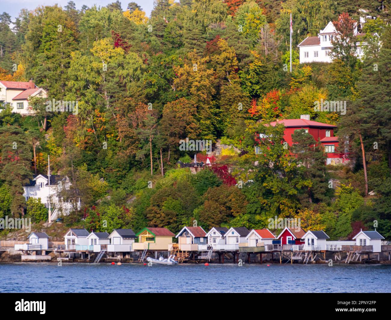 Nesoddtangen, Norway - Sep, 2022: Bath houses on the seaside overlooking the fjord  seen from the sighting tour on the Oslo Fjord near Oslo, municipal Stock Photo