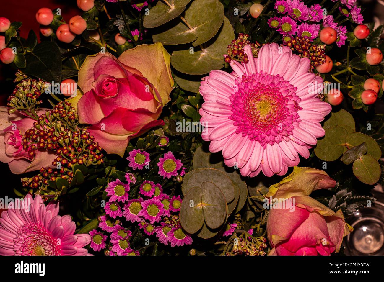 A vibrant arrangement of blooms featuring lush pink flowers Stock Photo ...