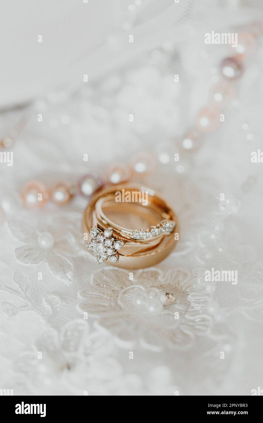 Gold wedding rings with diamond details Stock Photo