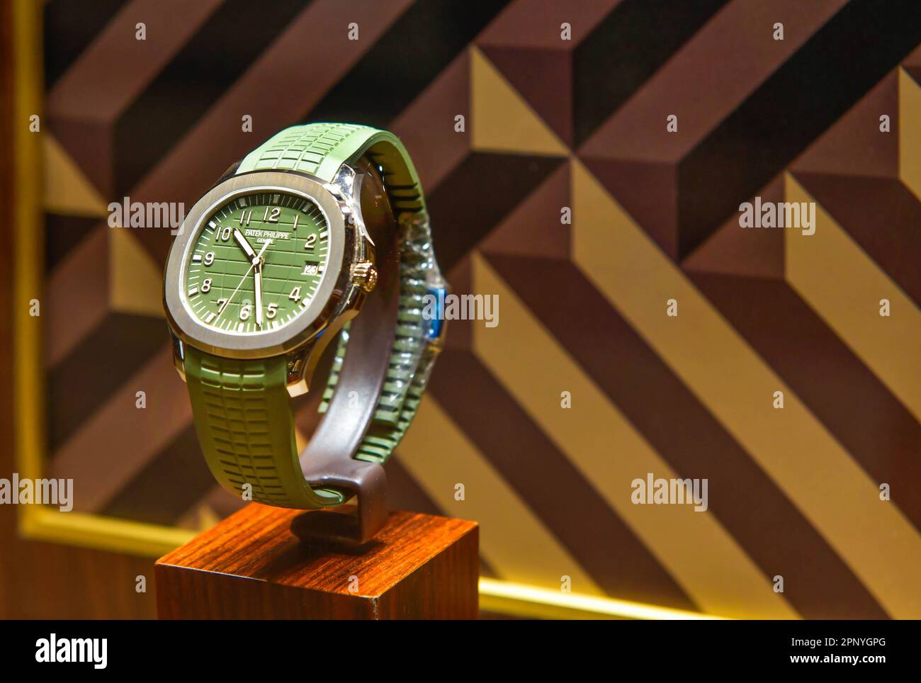 BANGKOK, THAILAND - April 12, 2022 :Patek Philippe Aquanaut 5168G Swiss watch displayed in a store Stock Photo