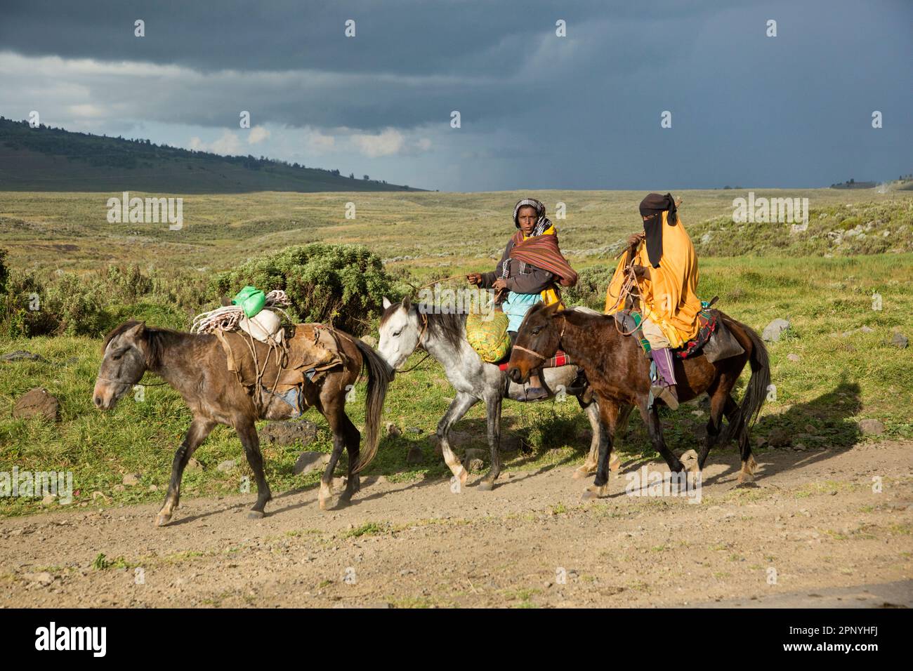 Farmers riding horses on their way to work Ethiopia Stock Photo - Alamy
