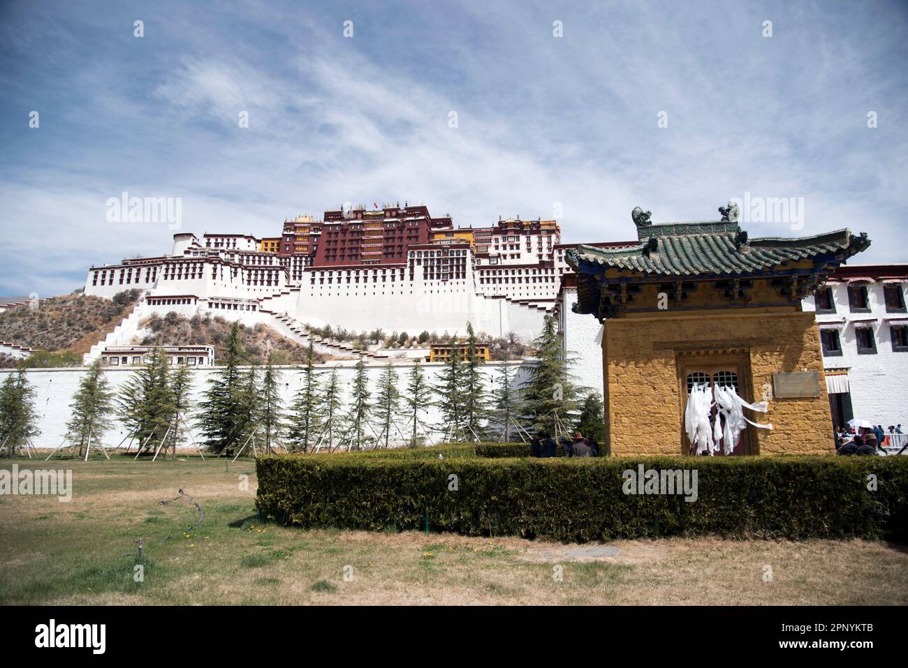 Aerial view of the magnificent Potala Palace perched atop a hill in ...