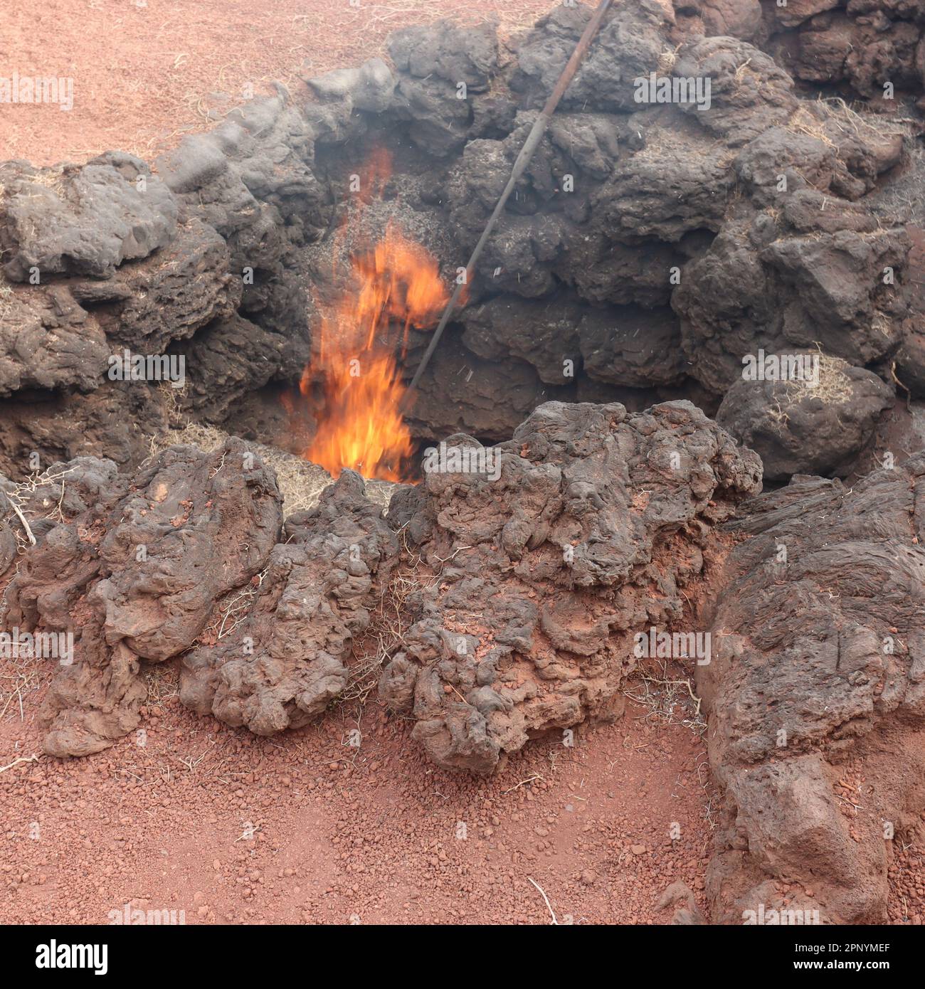 Fire in a lava hole in the Timanfaya National Park on Lanzarote Stock Photo