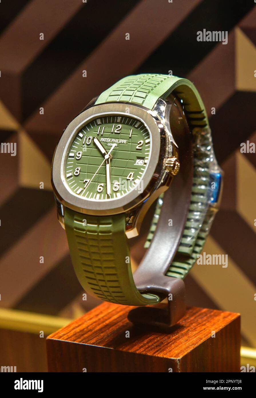 BANGKOK, THAILAND - April 12, 2022 :Patek Philippe Aquanaut 5168G Swiss watch displayed in a store Stock Photo