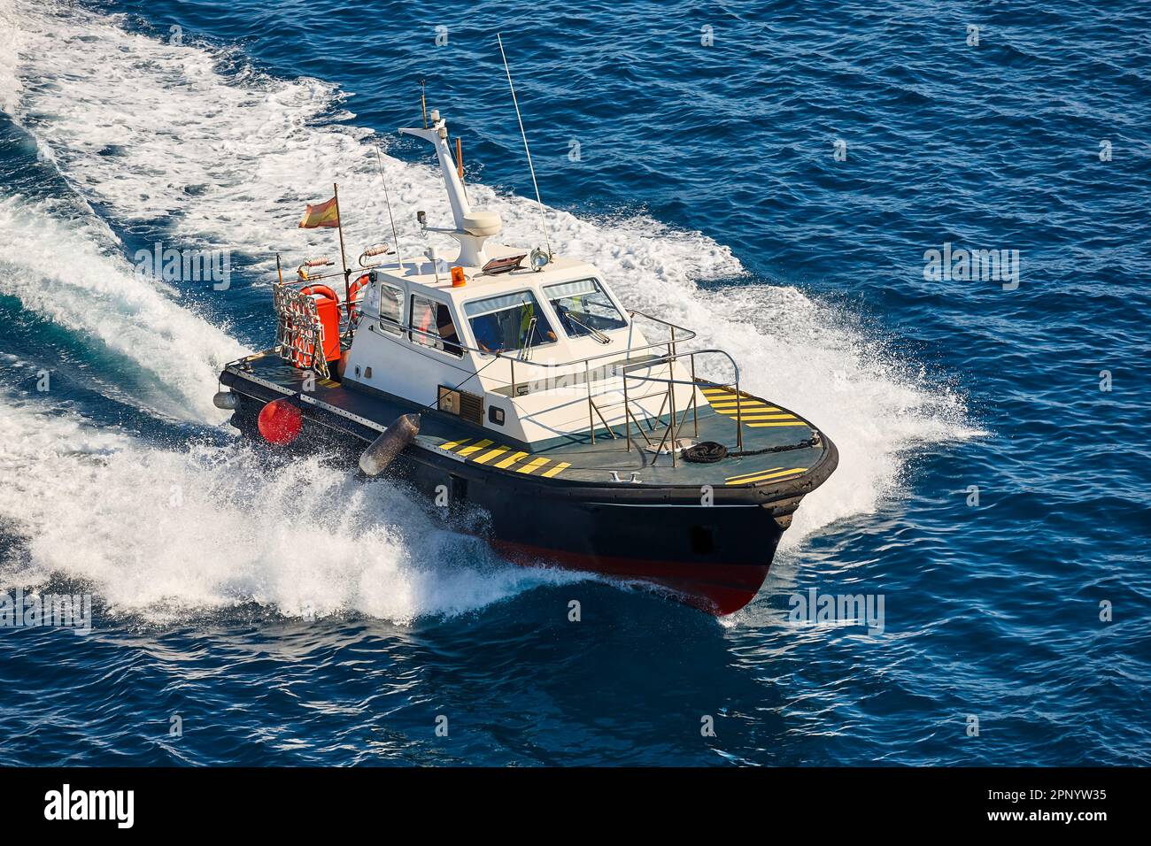 Pilot vessel operating on the sea. Harbor maritime control Stock Photo