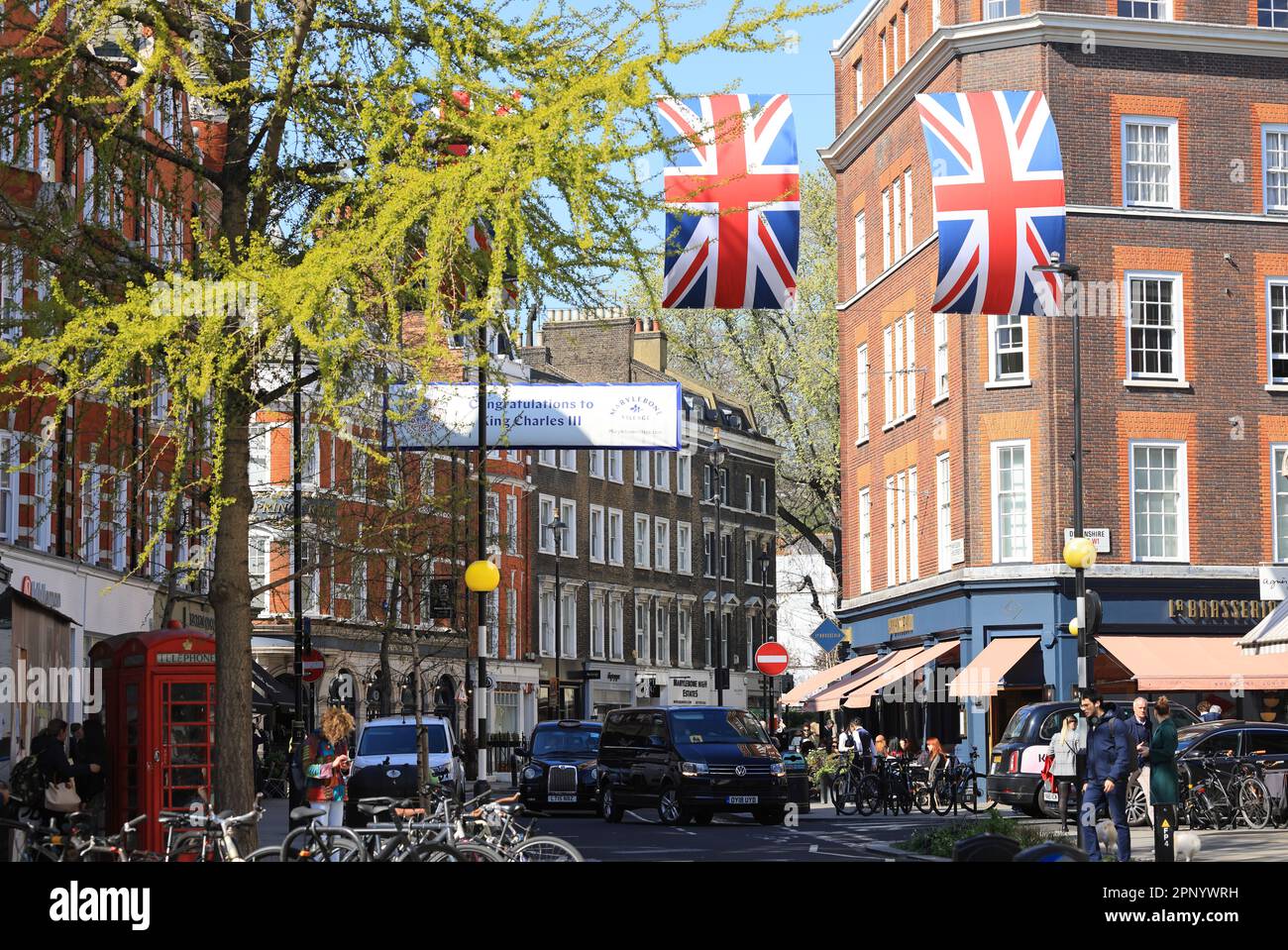 Getting ready for King Charles III's Coronation, the flags and bunting are up in Marylebone, central London, UK Stock Photo