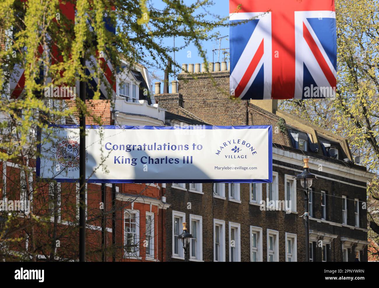 Getting ready for King Charles III's Coronation, the flags and bunting are up in Marylebone, central London, UK Stock Photo