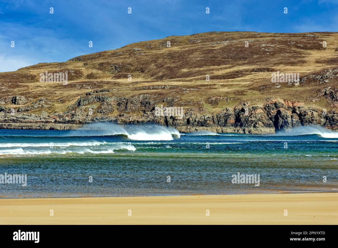 Torrisdale Bay Sutherland Scotland a blue sky and wind swept waves on a blue green sea Stock Photo