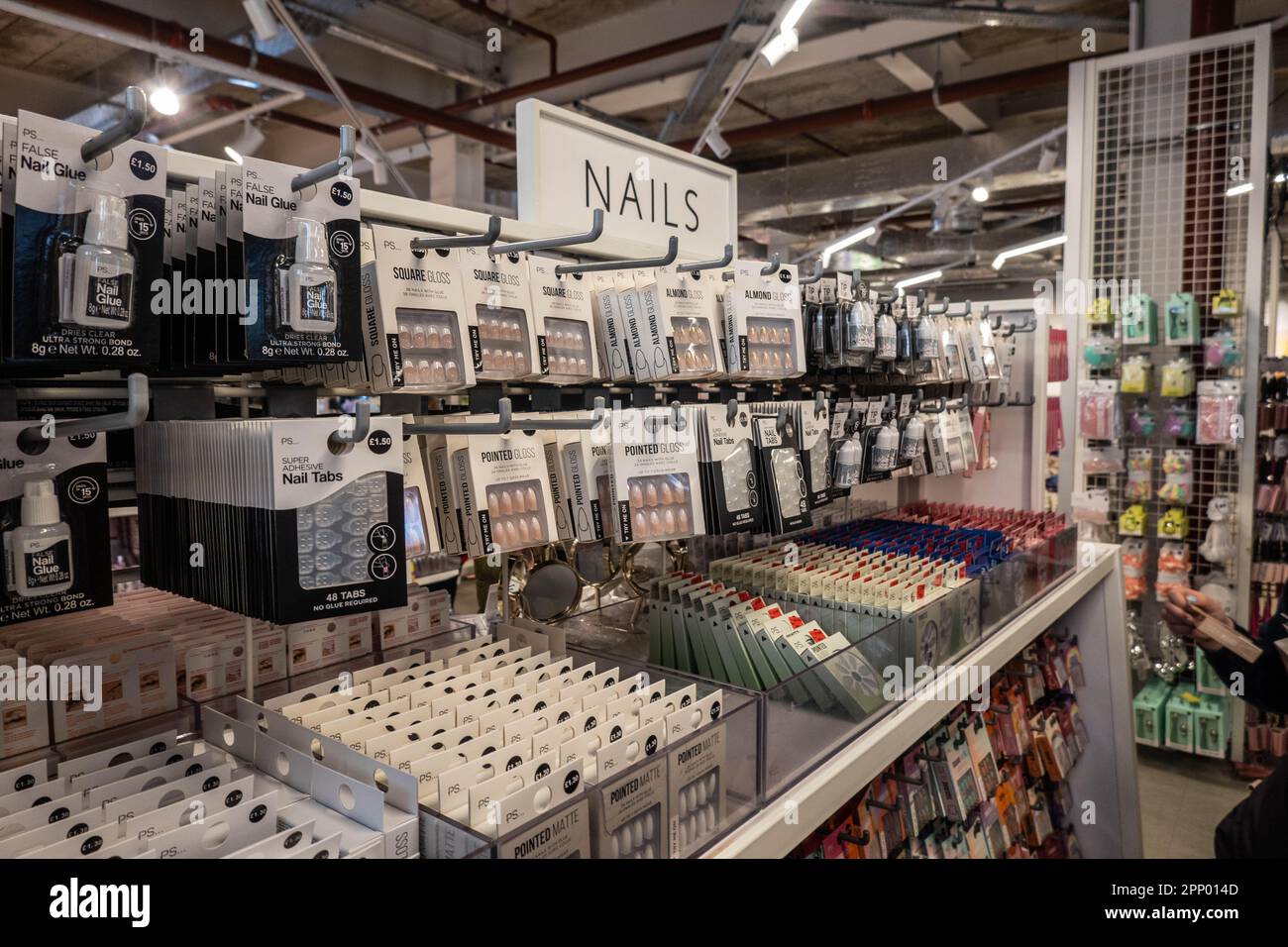 Primark store shelves stocked with false nails Stock Photo Alamy