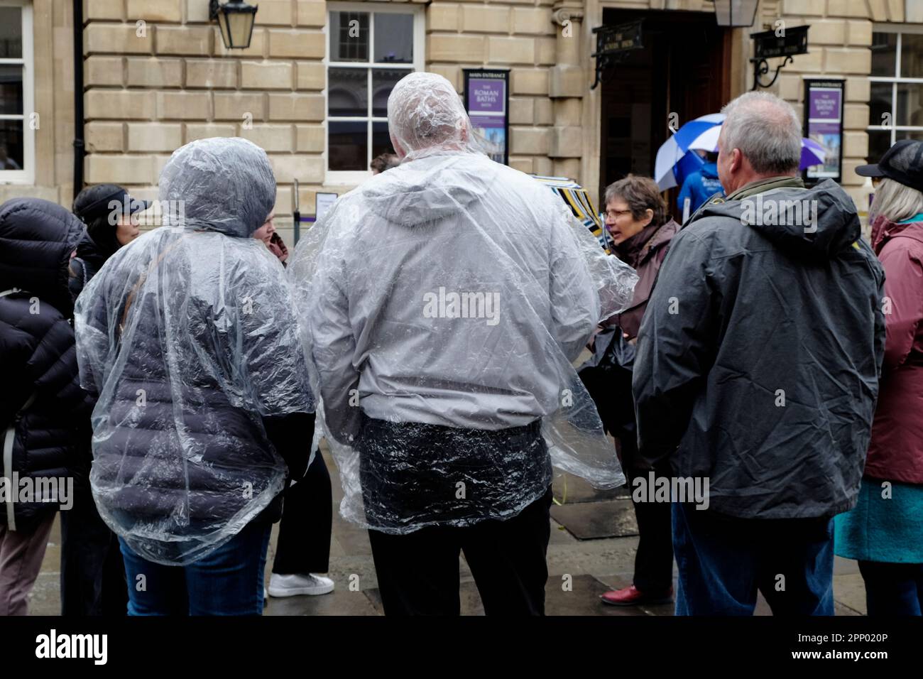 A giant purse of Dior store on East 57th. St. where pedestrians trying to  cover themselves from the rain today in Manhattan. Photo Credit: Mariela  Lombard/ZUMA Press Stock Photo - Alamy