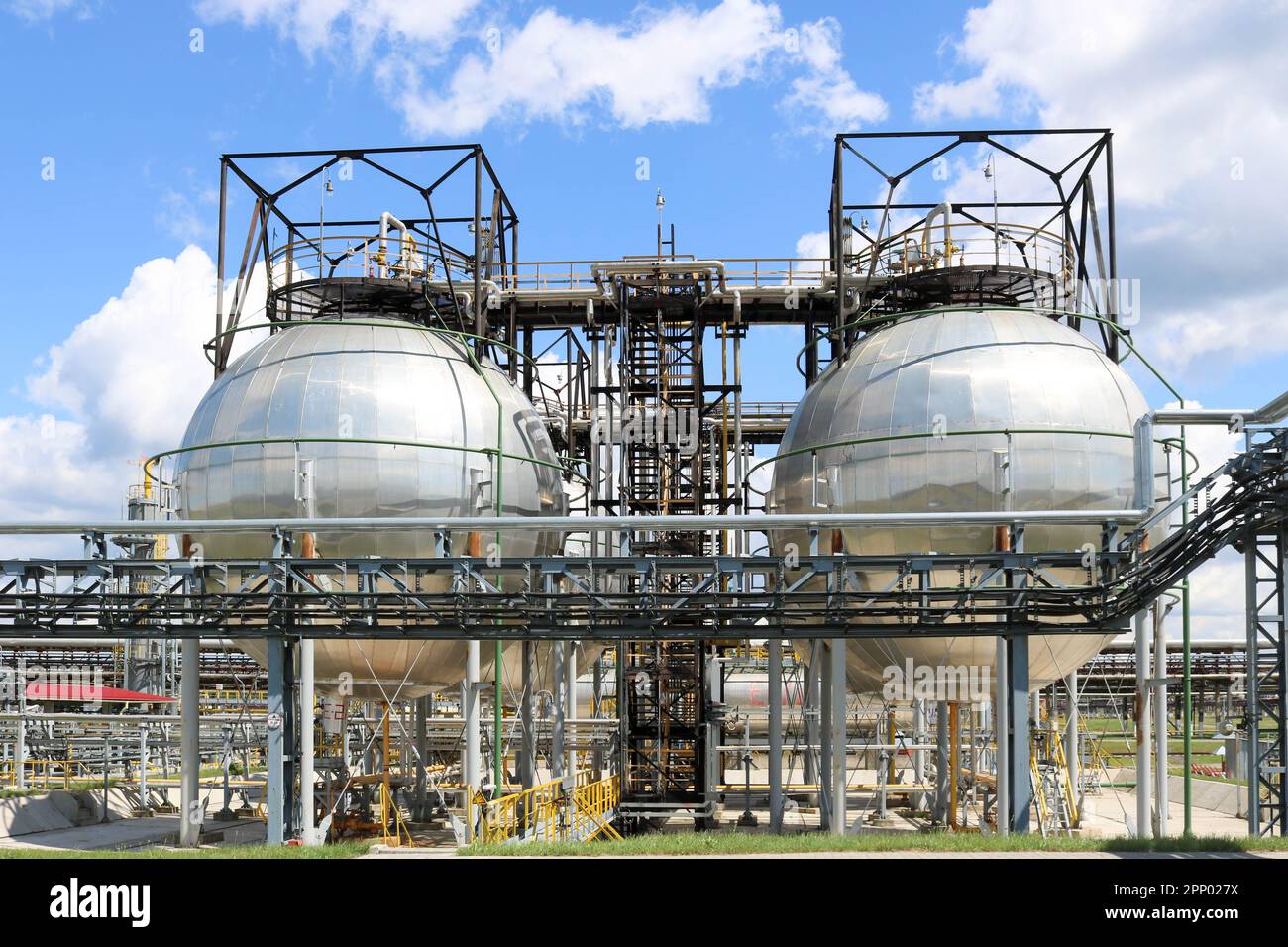 A large round ballshaped shiny metallic highpressure iron storage