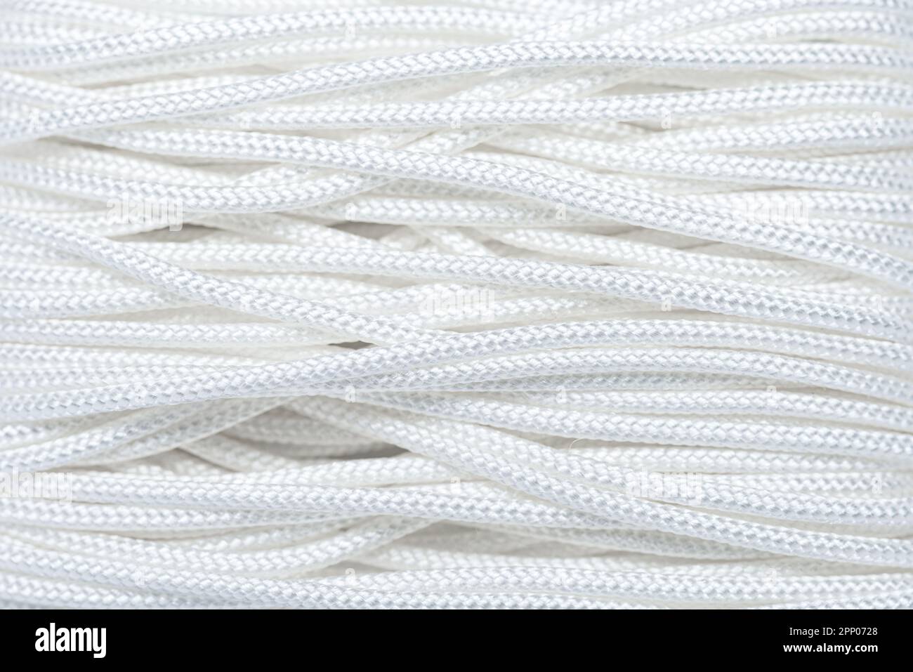 Close-up of white cord or string yarn, fine details of cotton thread,  textured background or backdrop with copy space for text Stock Photo - Alamy