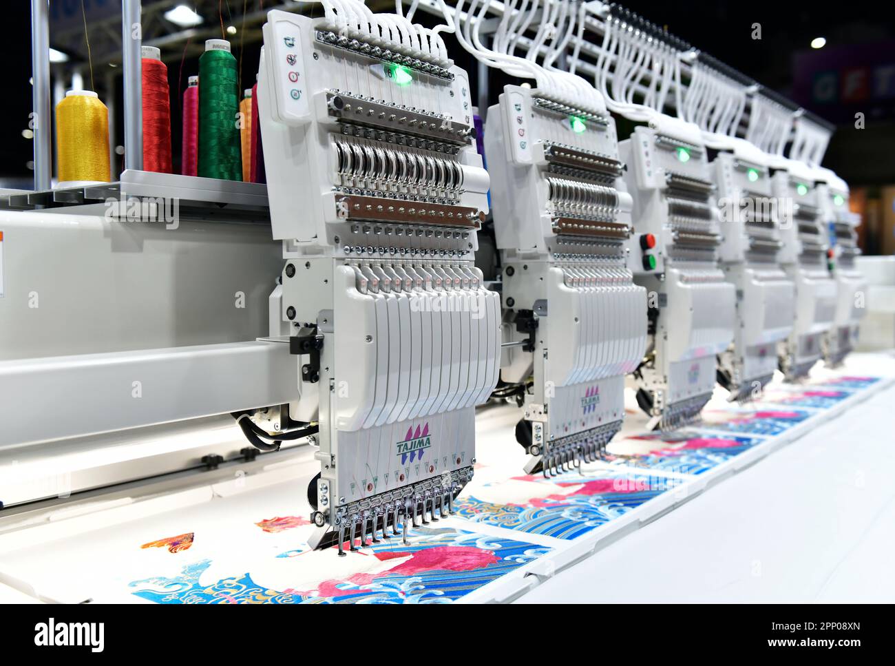 High speed flat multi-heads type embroidery machine manufacturing Stock Photo