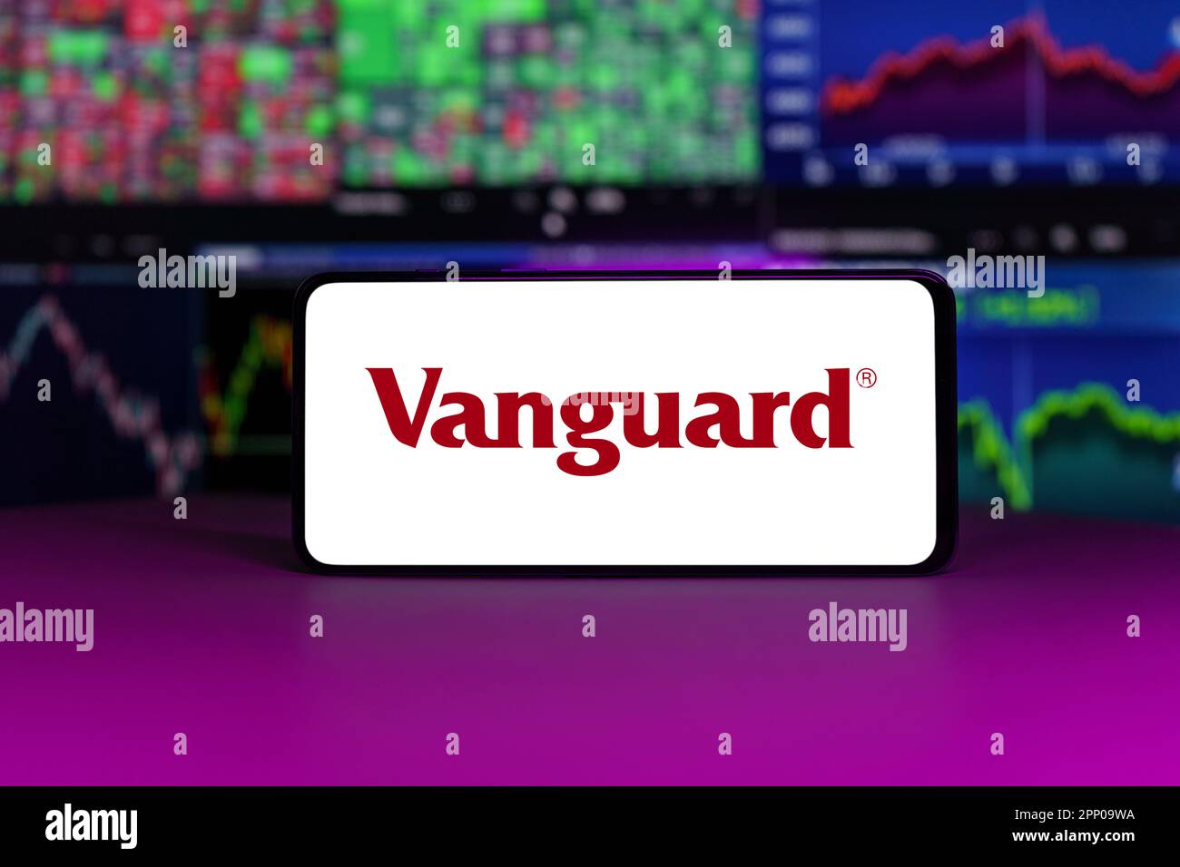 Vanguard stock market index in front of stock market charts background Stock Photo Alamy