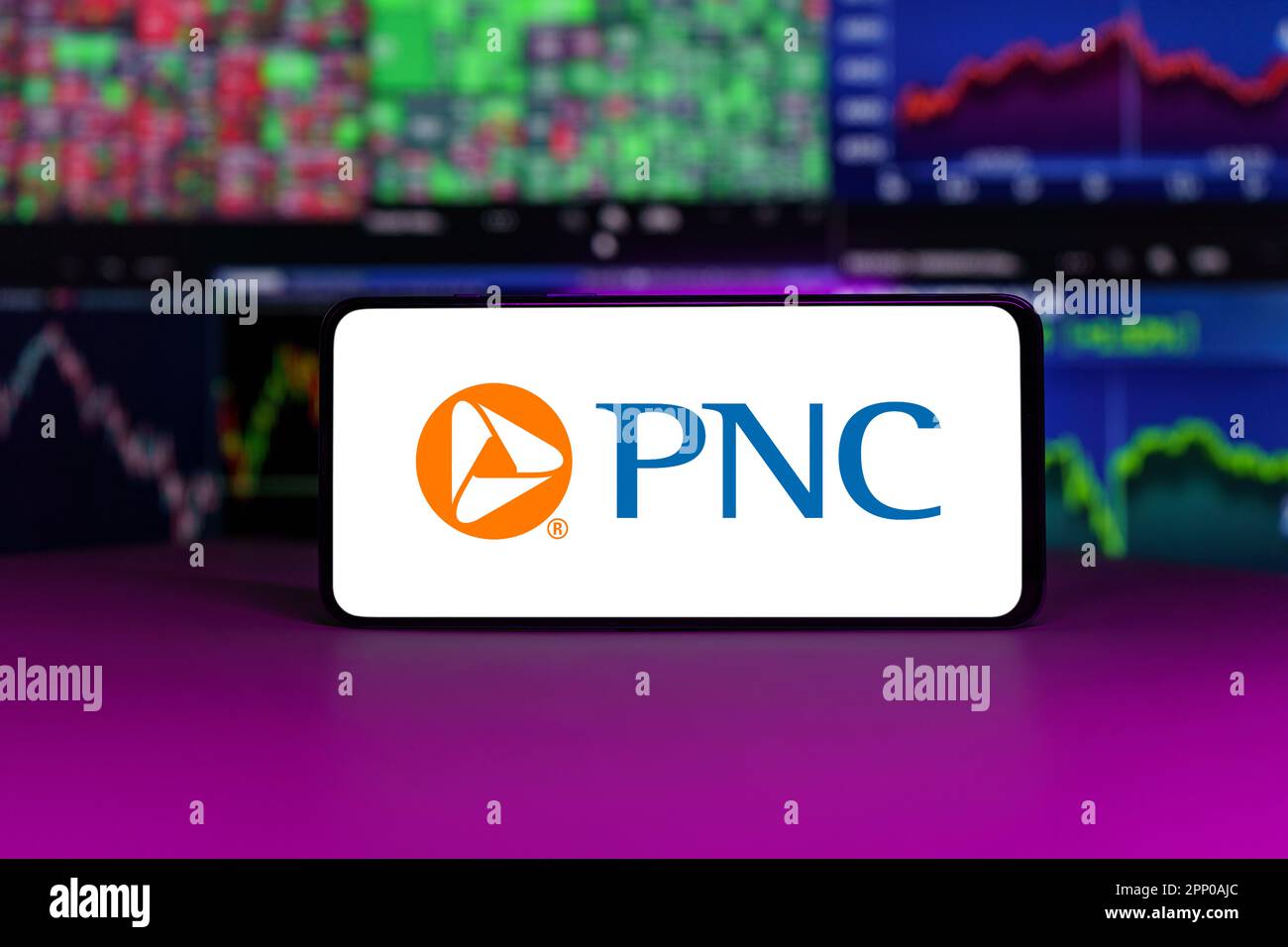 PNC financial service group on stock market index in front of stock market charts background Stock Photo