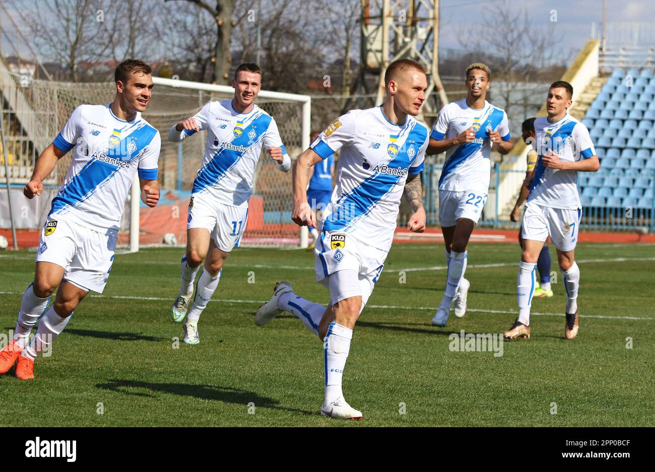 Uzhhorod, Ukraine - March 12, 2023: Dynamo Kyiv players celebrate after scored a goal during the VBET Ukrainian Premier League game against SC Dnipro-1 at Avanhard stadium in Uzhhorod Stock Photo