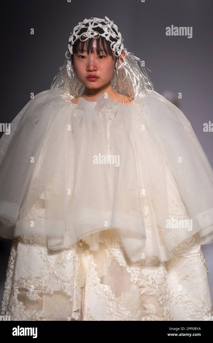 minju next in fashion wedding dress London, UK. 21 April 2023. A model wears a look by Korean fashion designer  Minju Kim at a catwalk presentation for Fashion in Motion at the V&A museum  in South Kensington. On