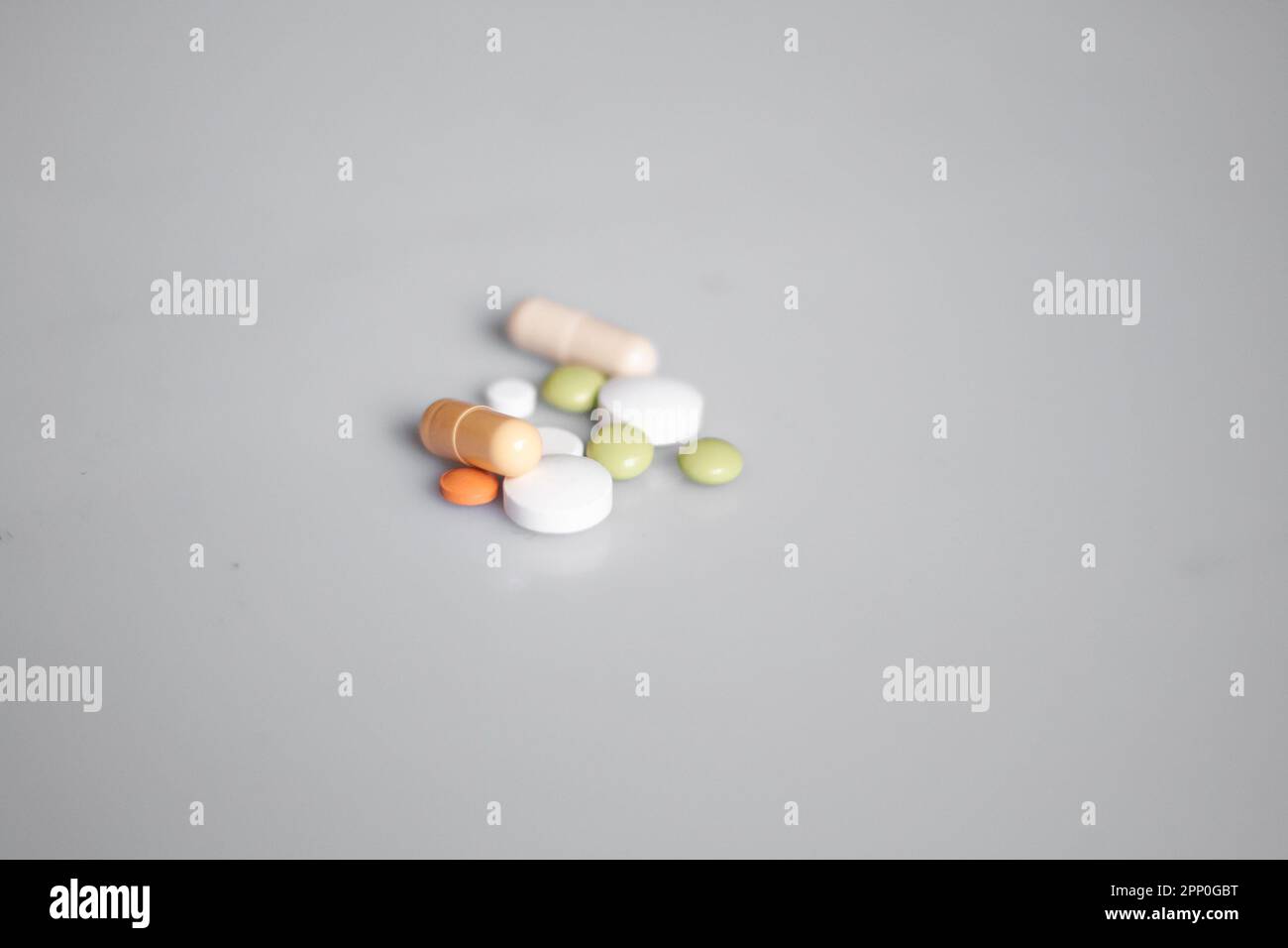 Close up of colourful pills on the white background Stock Photo