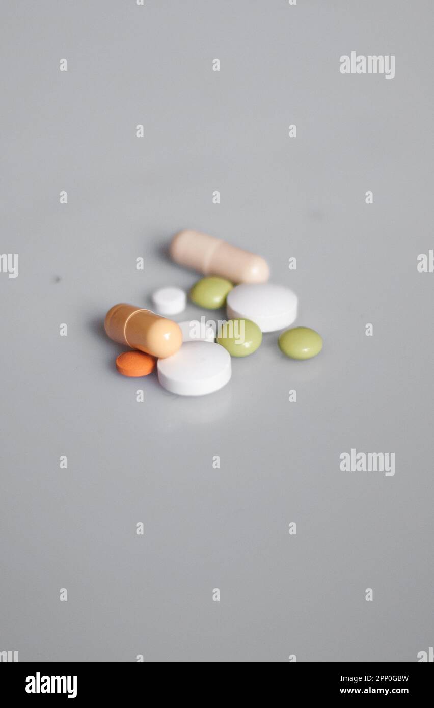 View of colourful pills on the white background Stock Photo