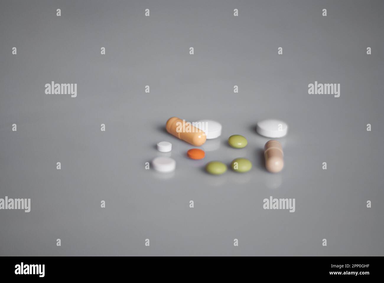 Colourful pills on the white background Stock Photo