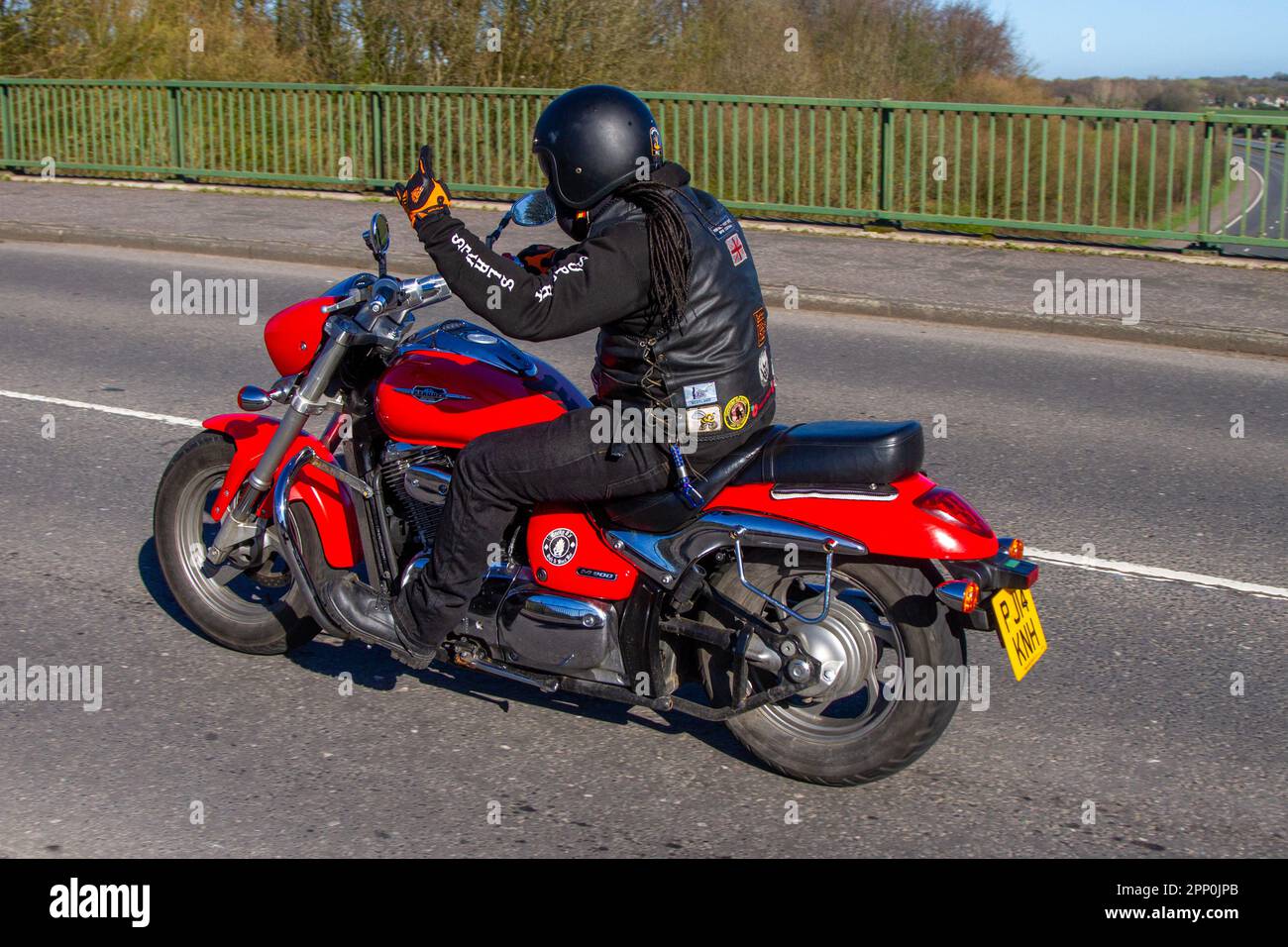 2014 Suzuki Vz 800 L4 V Twin Red Motorcycle Cruiser Petrol 805 cc; crossing motorway bridge in Greater Manchester, UK Stock Photo