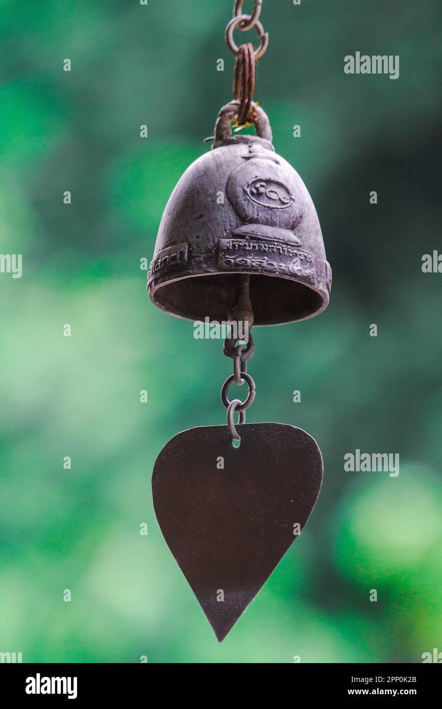 Small brass bells are commonly hung in Thai temples Stock Photo Alamy
