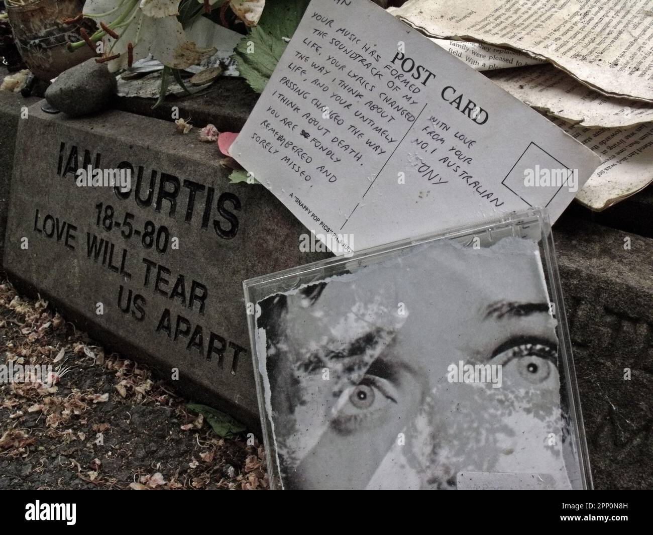 Ian Curtis 18-5-80 Love Will Tear Us Apart, memorial stone, Macclesfield Crematorium, Cheshire, England, UK Stock Photo