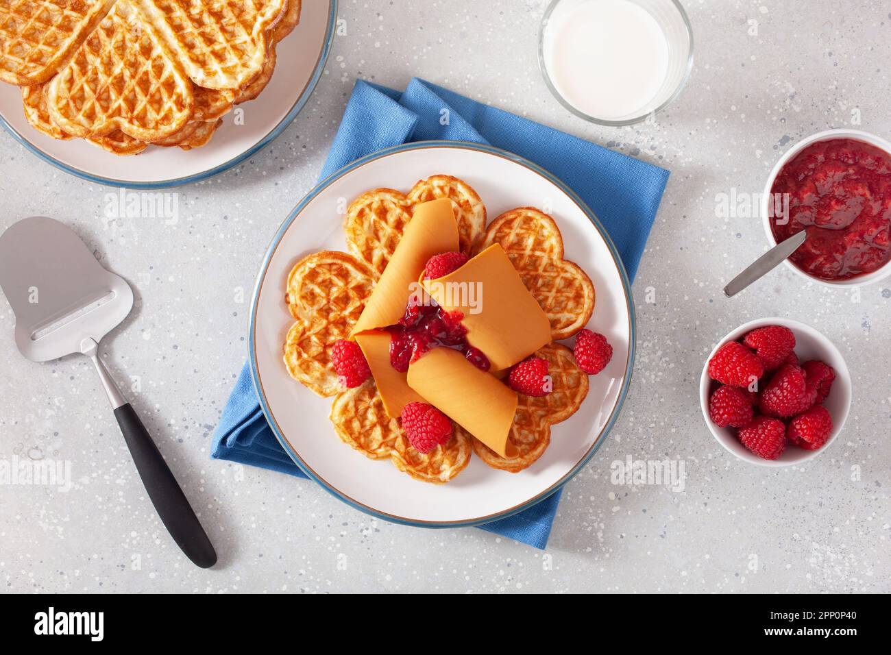 waffles with Norwegian brunost traditional brown cheese and raspberry