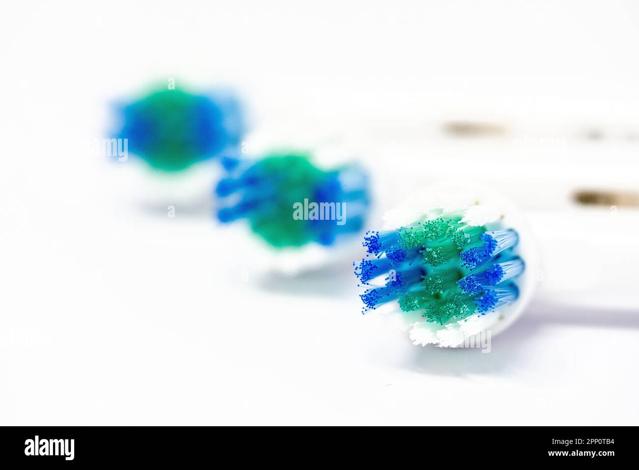 Three interchangeable heads for a electric toothbrush Stock Photo Alamy