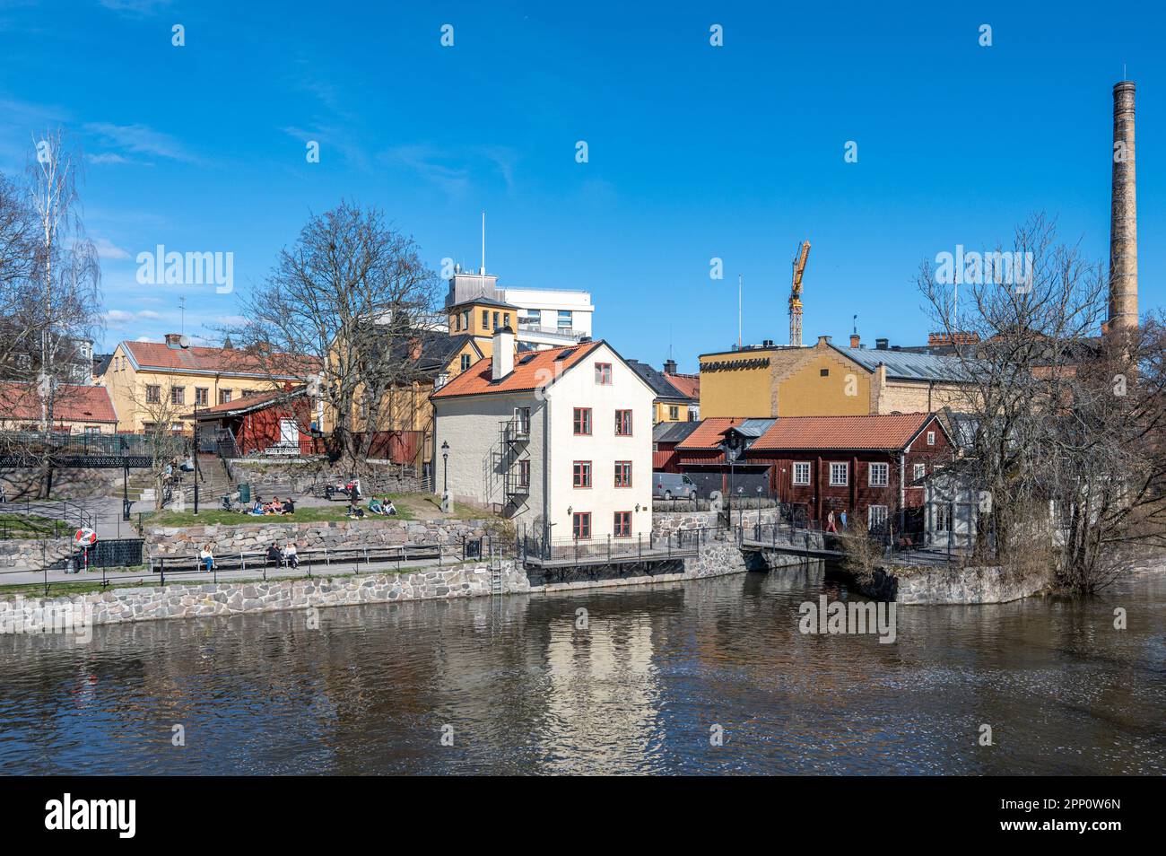 The Park of Love in the historic industrial landscape along Motala river on a sunny spring day in April 2023 in Norrköping; Sweden Stock Photo