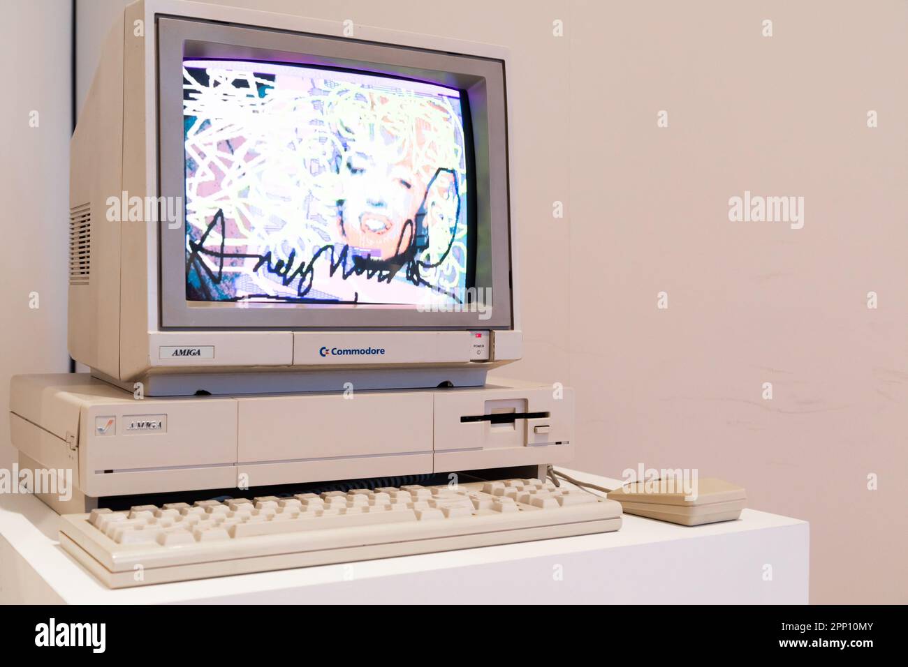 Venaria Reale, Italy - October 2022: Computer Commodore Amiga 1000 with floppy disk, mouse, beige Stock Photo