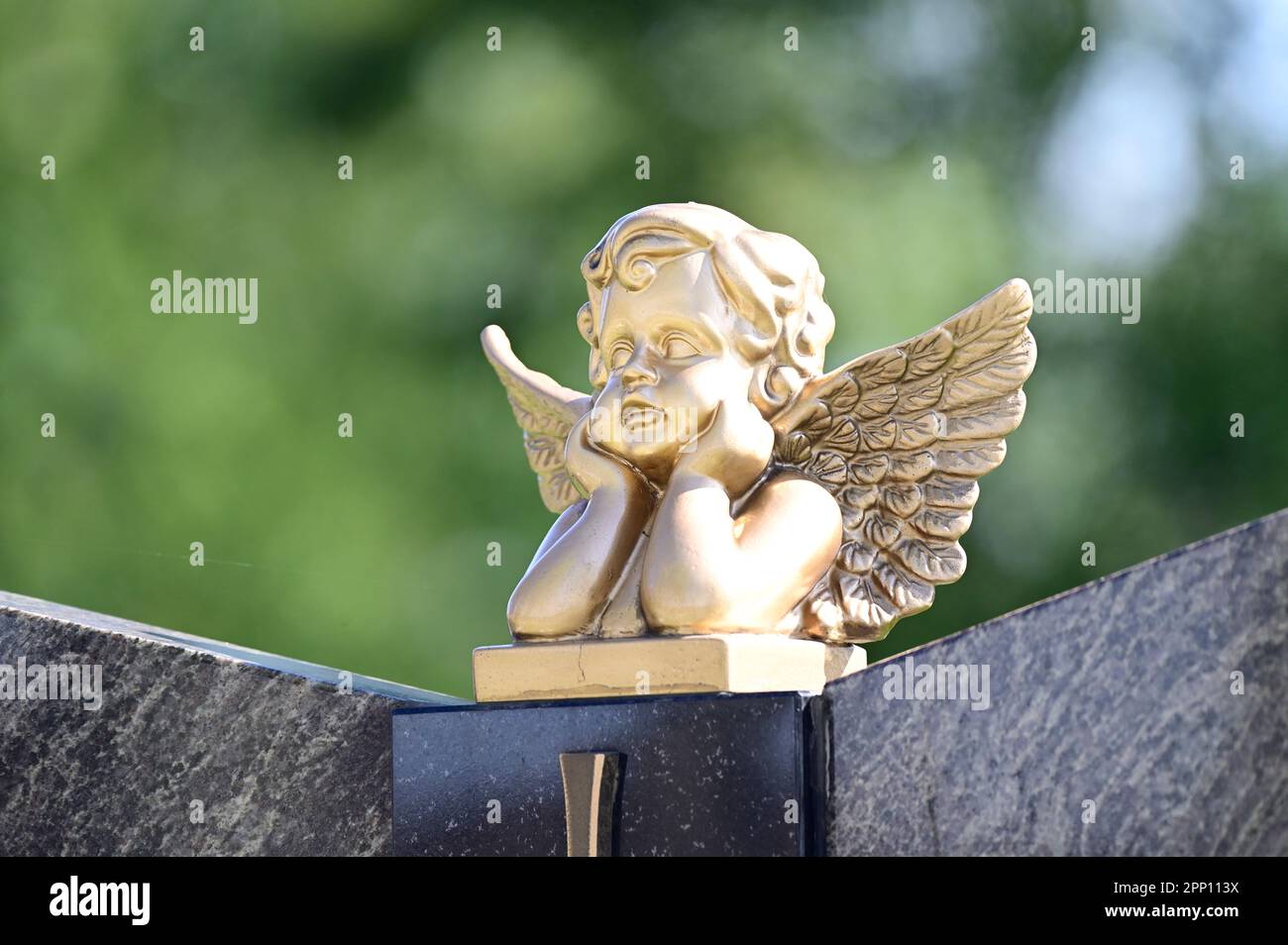 Vienna, Austria. Vienna Central Cemetery. Angel figure on a tombstone at the Central Cemetery Stock Photo