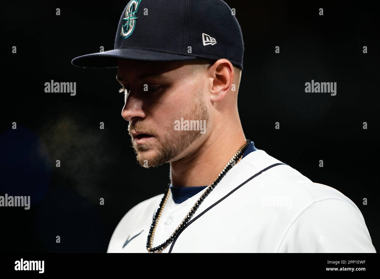 Seattle Mariners left fielder Jarred Kelenic walks off the field in