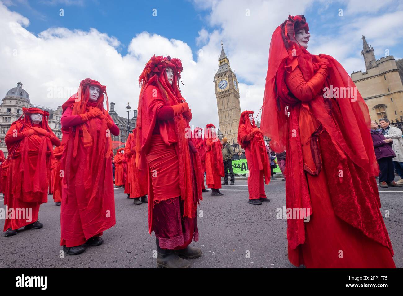 London, UK. 21 Apr 2023. People march on the first day of Extinction Rebellion's 'The Big One' from Trafalgar Square to the Ministry of Transport demanding for an end to the use of private jets, the axing of subsidies to aviation and an ending of airport expansion. They say the industry produces a much carbon dioxide as the 6th largest polluting country, and without drastic cuts we will be unable to avoid disastrous climate change. Peter Marshall/Alamy Live News Stock Photo