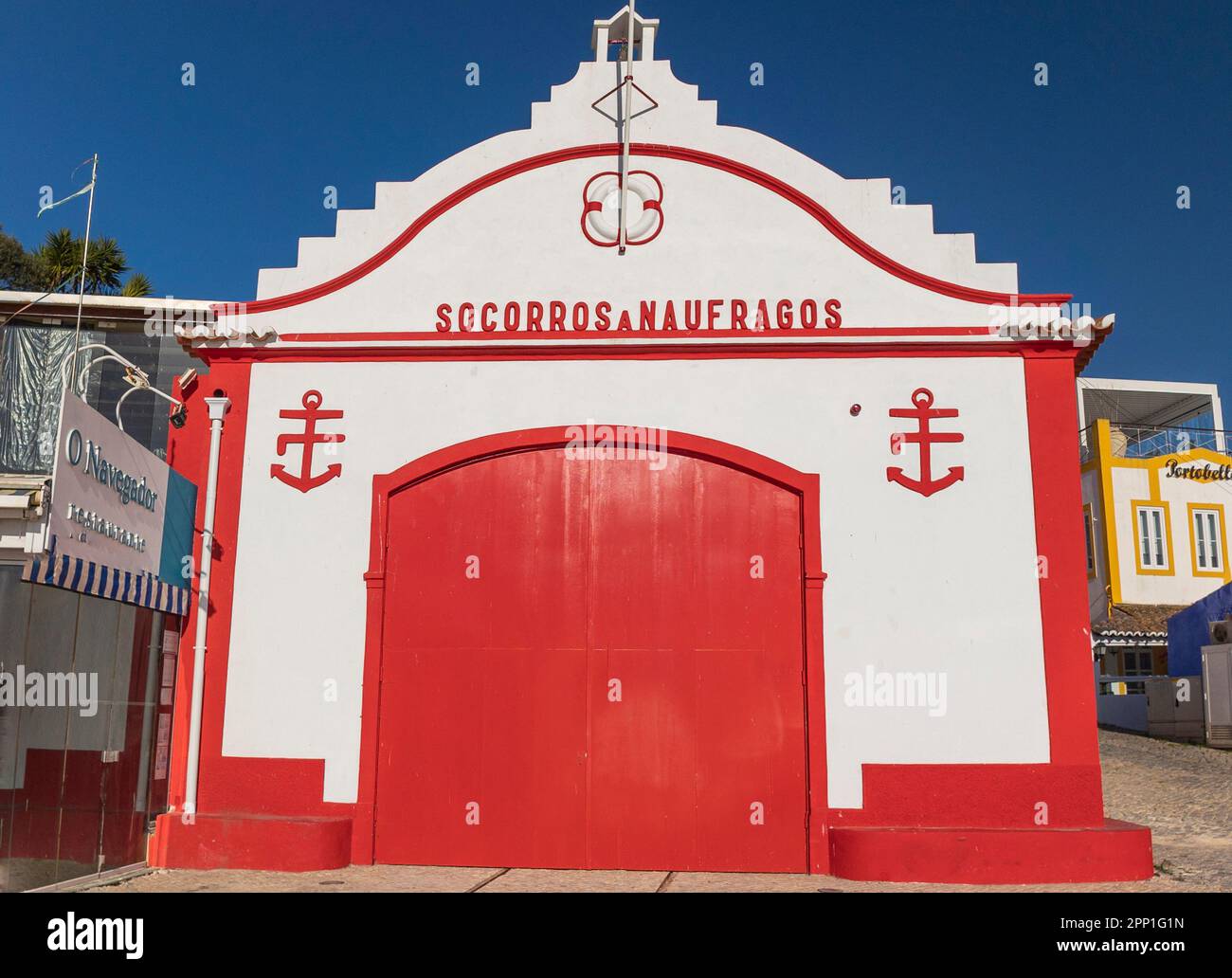 ALVOR, PORTUGAL - 16th APRIL, 2023: Restored old lifeguard station building dating from the 1920s in the town of Alvor. Stock Photo